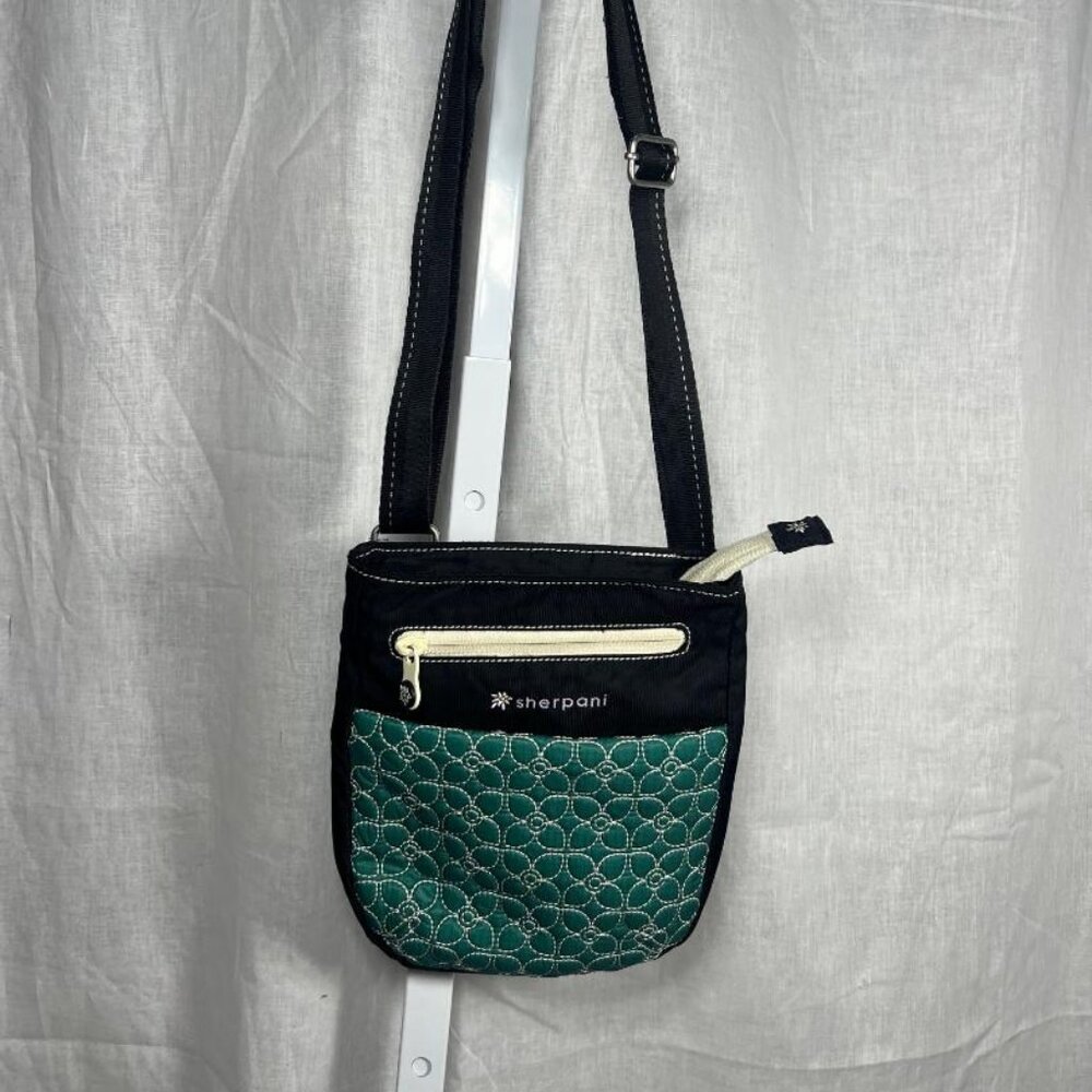 Sherpani Mini Crossbody in Black and Teal